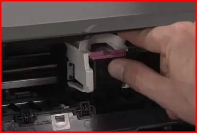 slide new ink cartridge in hp printer
